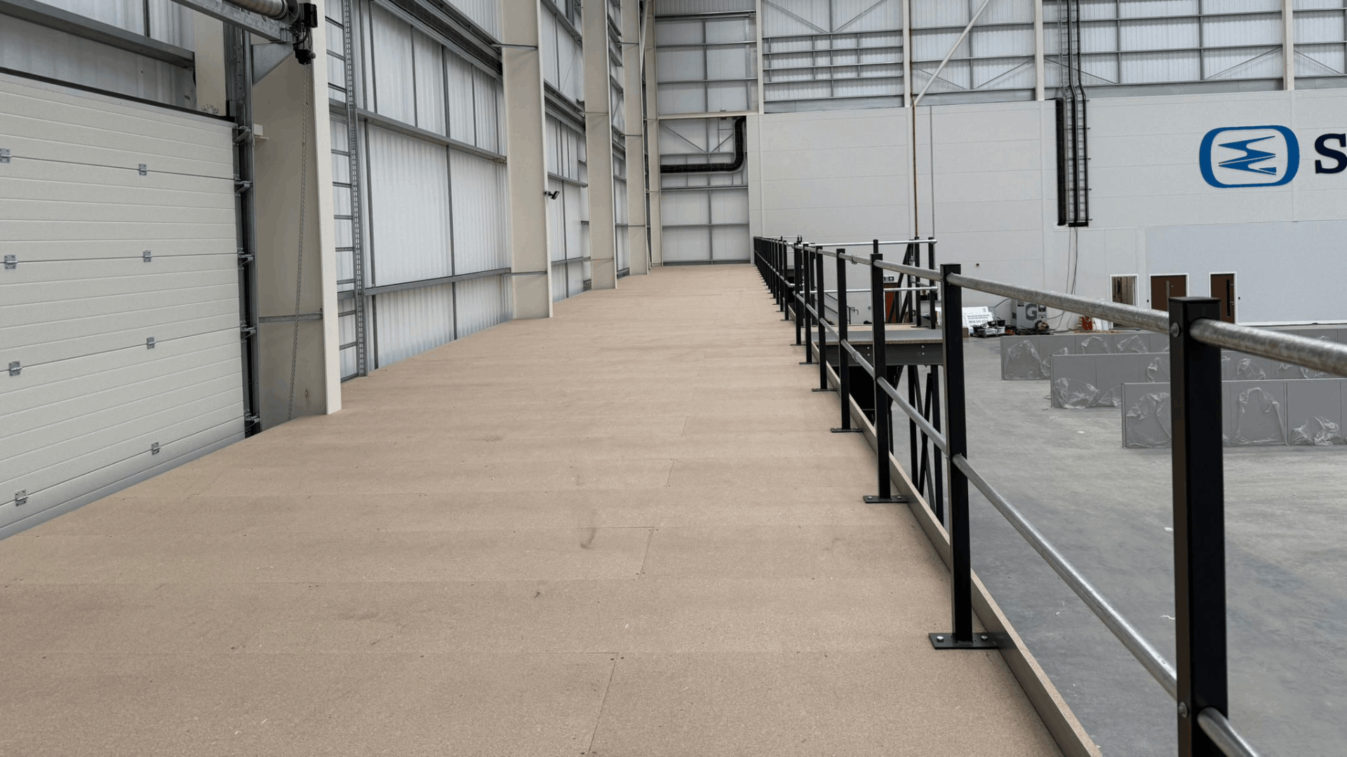 Smurfit Westrock mezzanine floor with timber decking, edge protection and warehouse views
